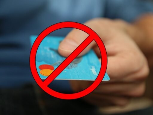 Composite image of a bank card and prohibited sign