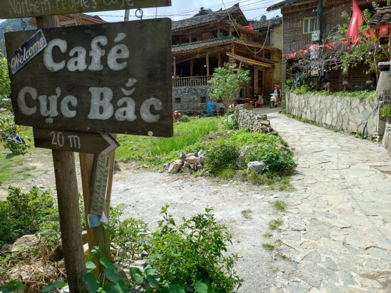 A cafe sign in a Lolo village